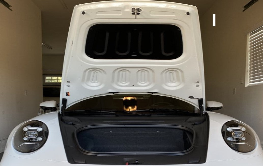 Porsche 992 after the Lid Liner has been installed.  Nylon clips insert to factory bracing so no tools or drilling required.